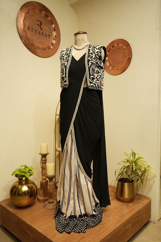Black drapped saree with embroidered jacket