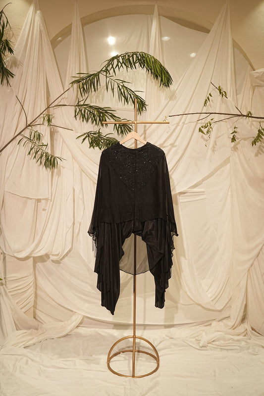 black kaped dress